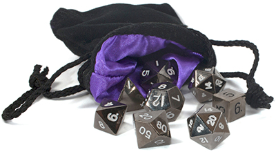 Photo of a black velvet dice bag spilling out a set of metal dice